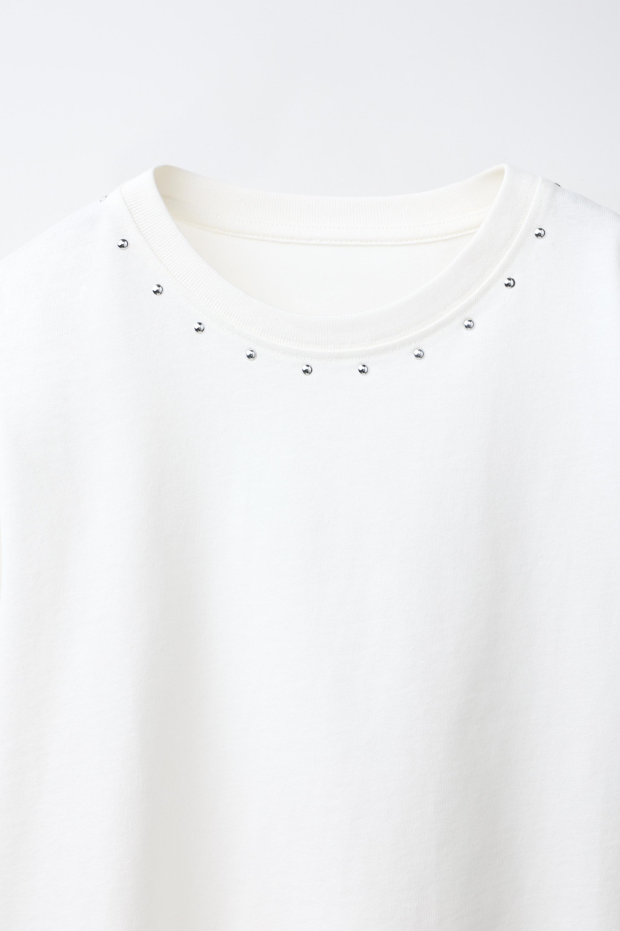 T-SHIRT À FRANGES ET CLOUS